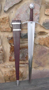 Cut and thrust hollow ground sword